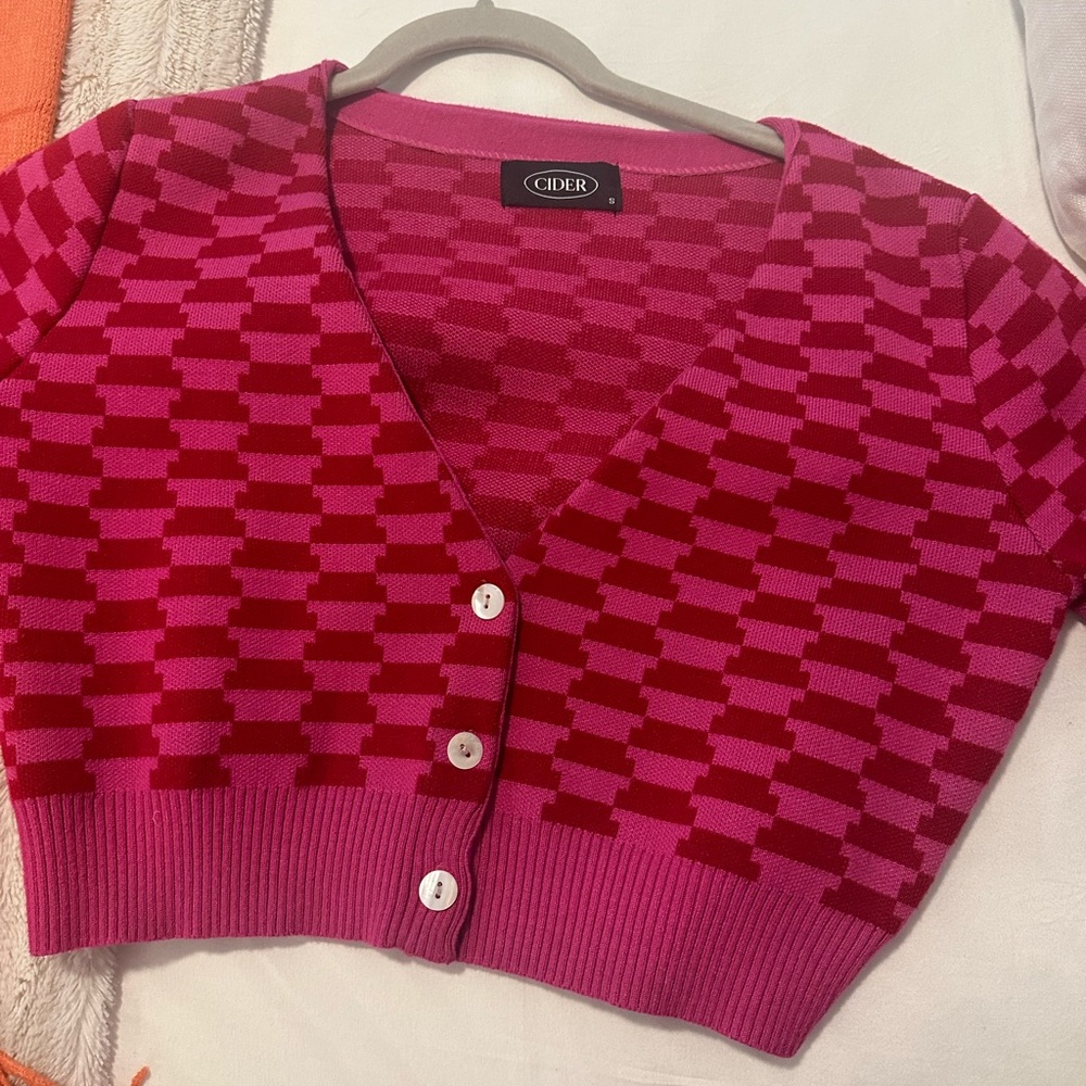 Pink and red sweater (slightly cropped)